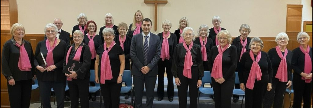 Cantilena Singers with their MD David Thomas at their most recent concert