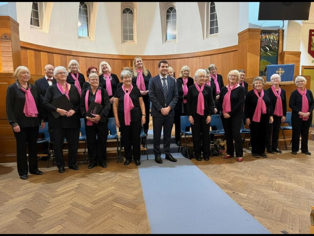 Cantilena Singers with their MD David Thomas at their most recent concert